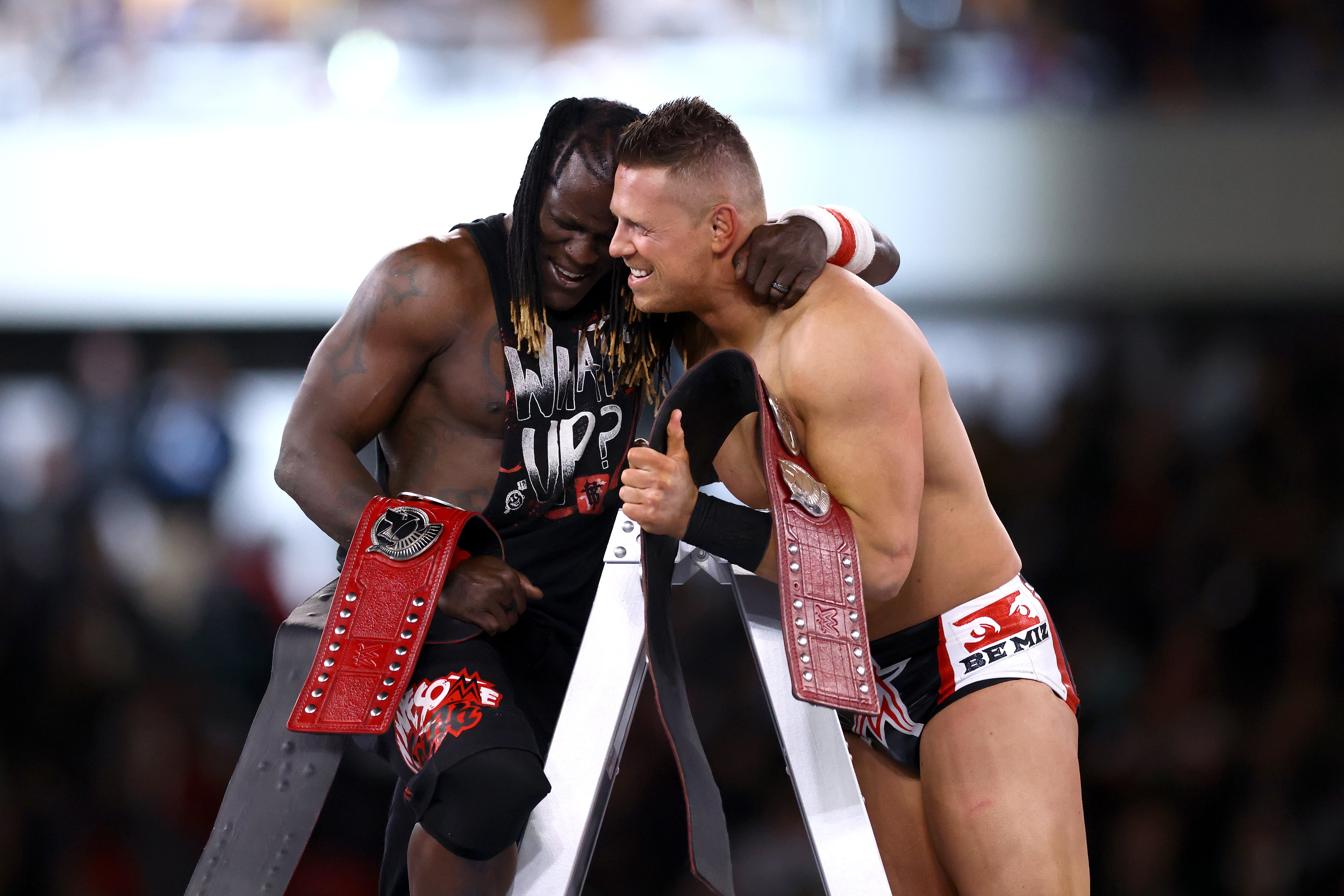 The Miz (right) and R-Truth celebrate winning the Raw tag-team titles