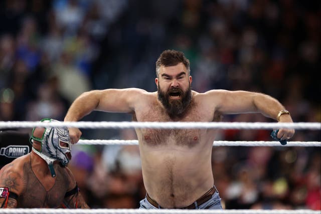 <p>Retired NFL star Jason Kelce (right) with Rey Mysterio at WrestleMania</p>