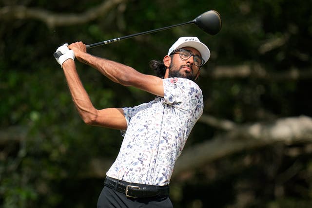 Akshay Bhatia watches his tee shot on the 14th hole during the third round of the Texas Open golf tournament (Eric Gay/AP)