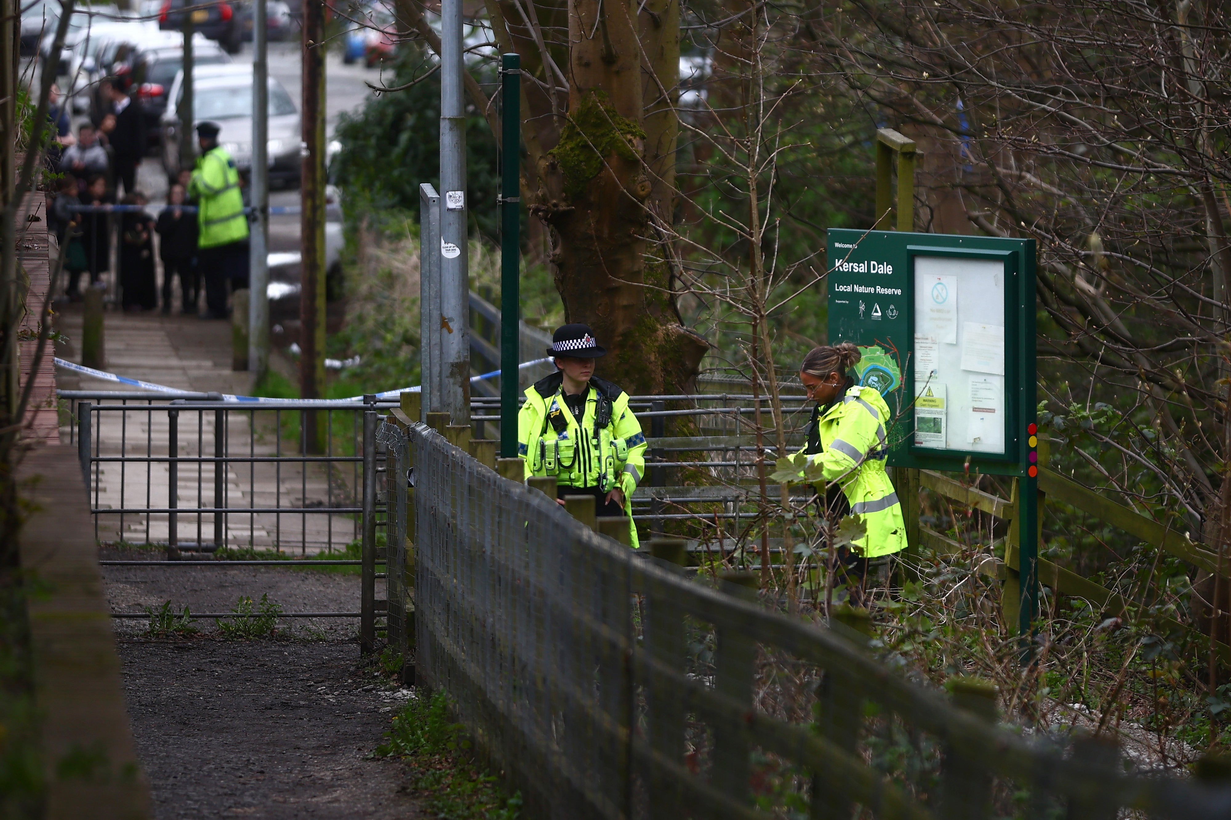 A heavy police presence guards the Kersal Dale woodlands where the remains were found on 5 April