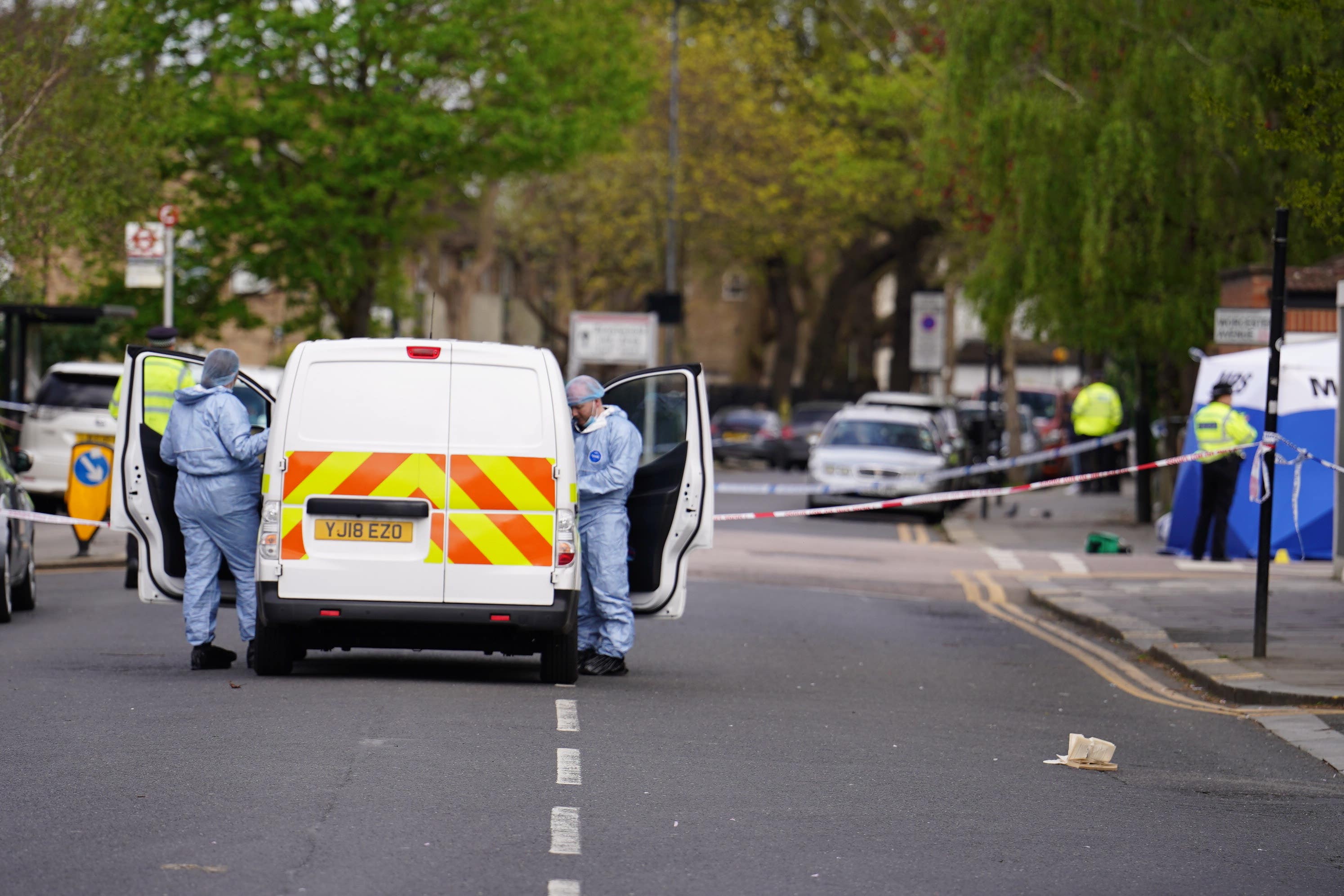 Police and Forensic investigators at the scene near the Tottenham Hotspur Stadium in north London after a man died following a stabbing (Jordan Pettitt/PA Wire)