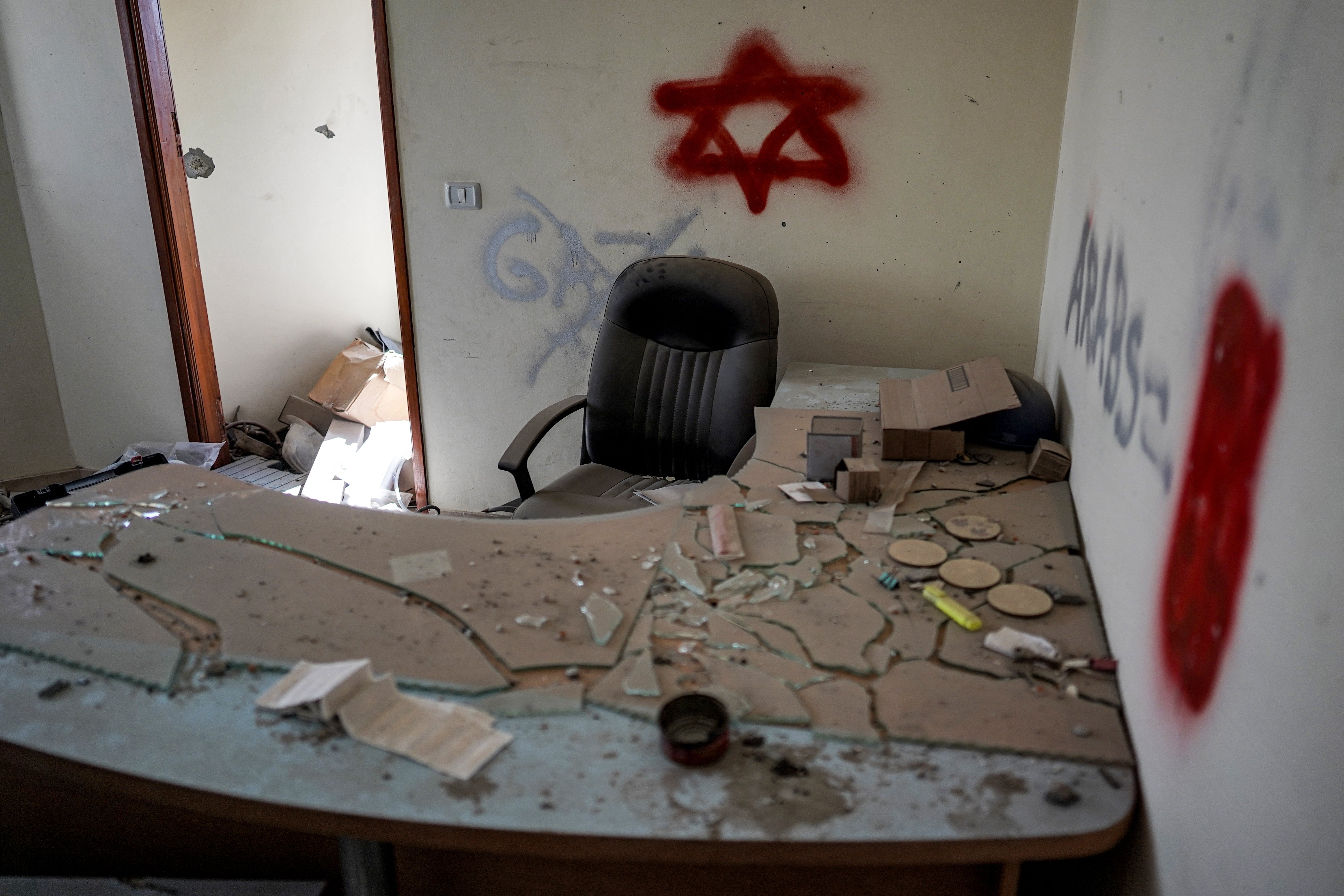 Graffiti left by Israeli forces inside a building in Khan Younis before Sunday’s troop withdrawal