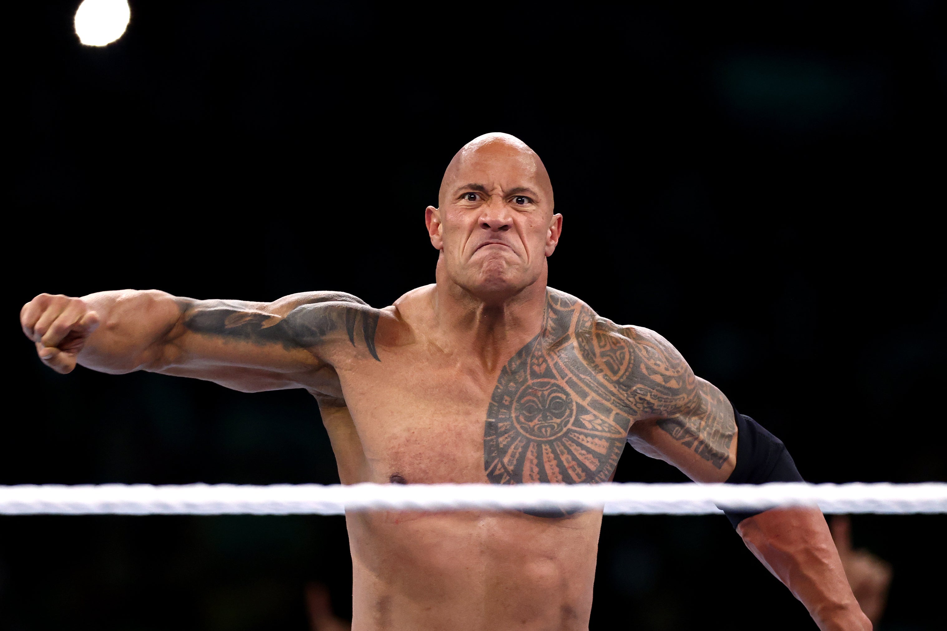 The Rock and Reigns defeated Rhodes and Seth Rollins