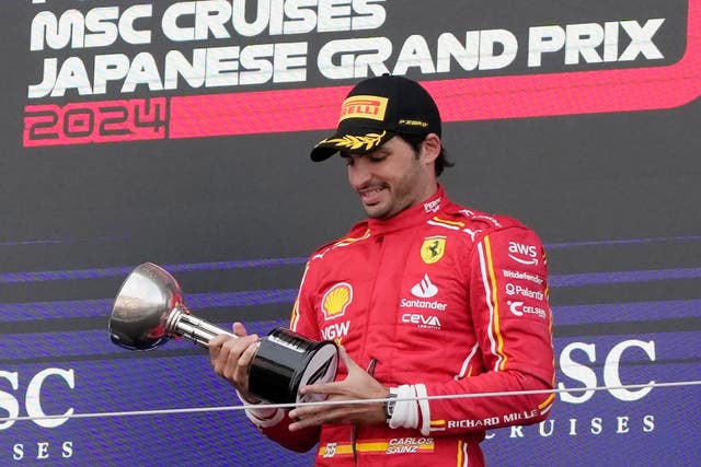 Carlos Sainz (pictured) finished third behind the Red Bulls of Max Verstappen and Sergio Perez at Suzuka (Hiro Komae/AP)