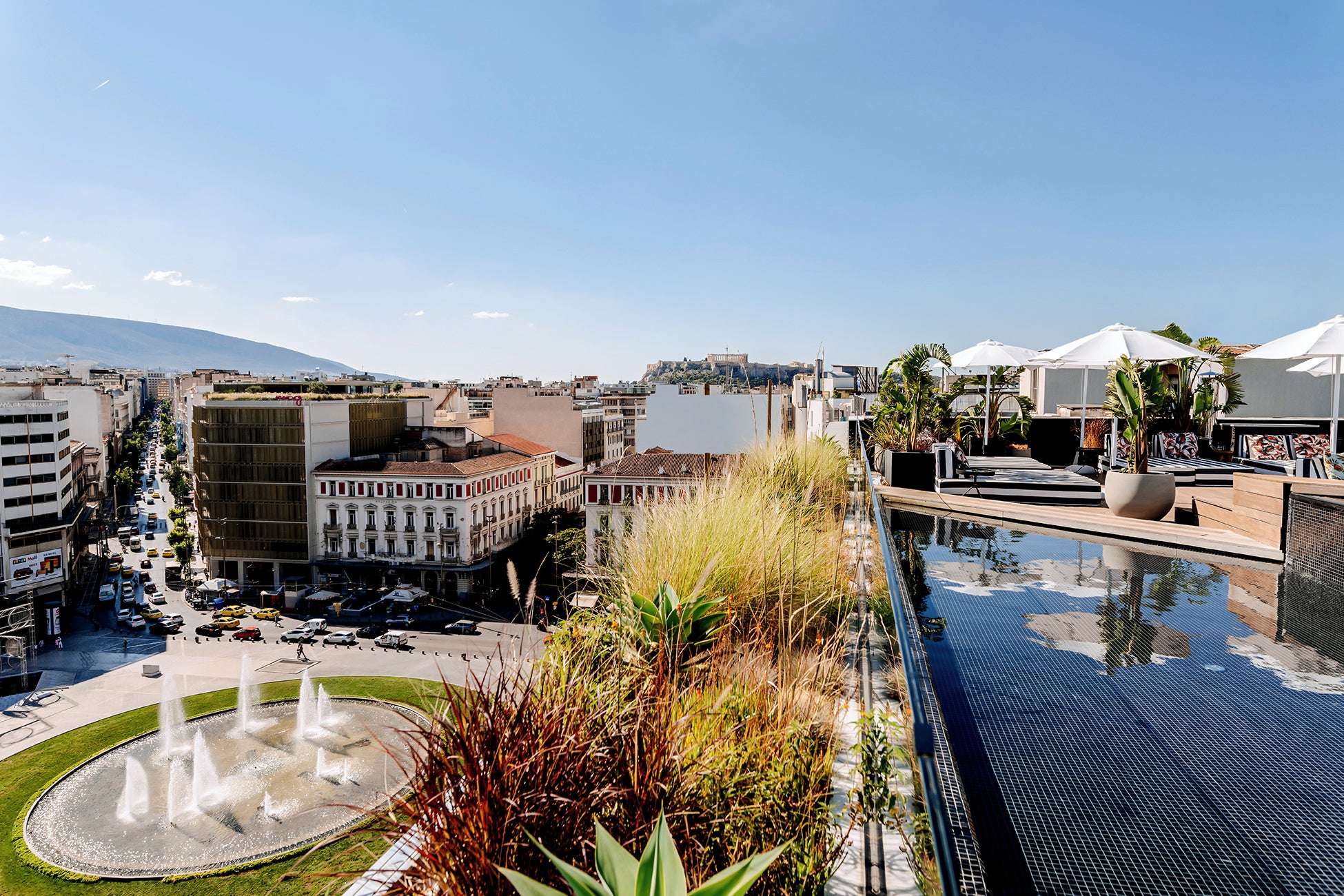 Enjoy stunning views across Athens from hotel Skylark’s stylish rooftop pool