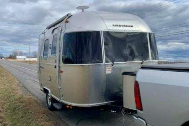 <p>Winds allegedly caused the trailer door to open </p>