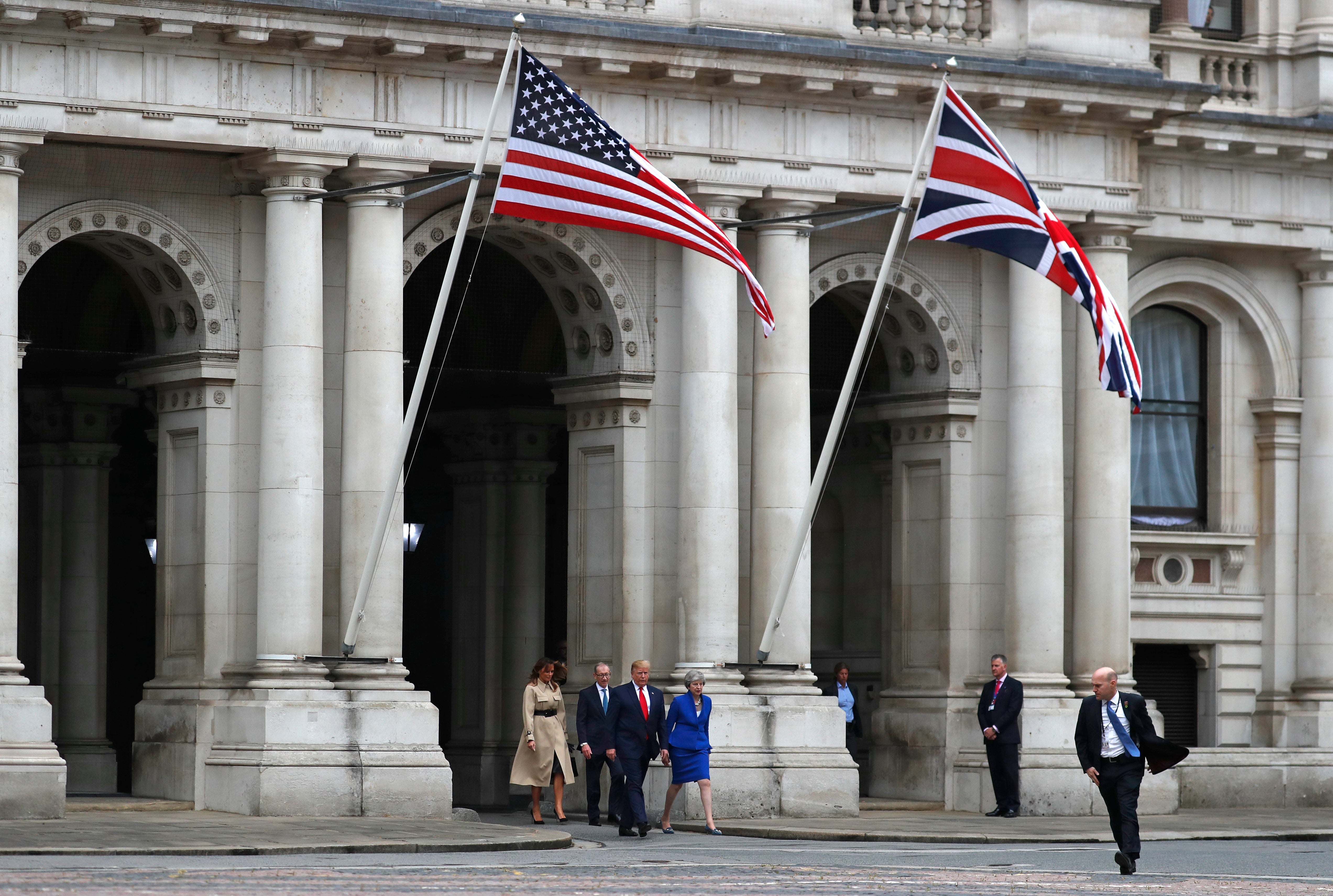 Theresa May and Donald Trump walk through the Quadrangle in 2017