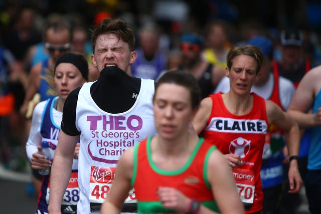 <p>Runners experience pain in the closing stages of the London Marathon</p>