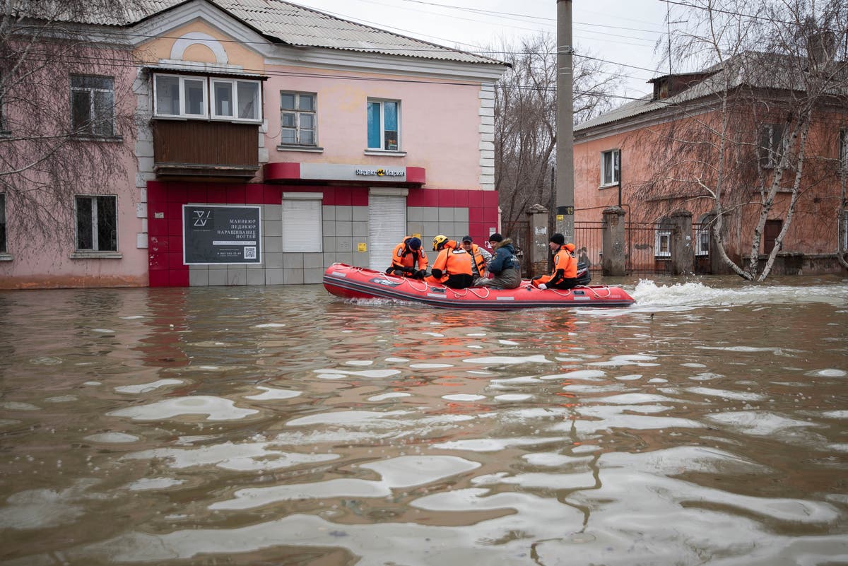 Russians stage a rare protest after a dam bursts and homes flood near ...