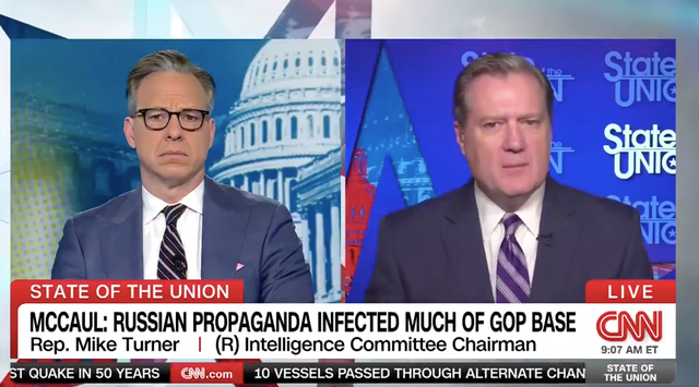 <p>Mike Turner (right) during his interview on CNN</p>