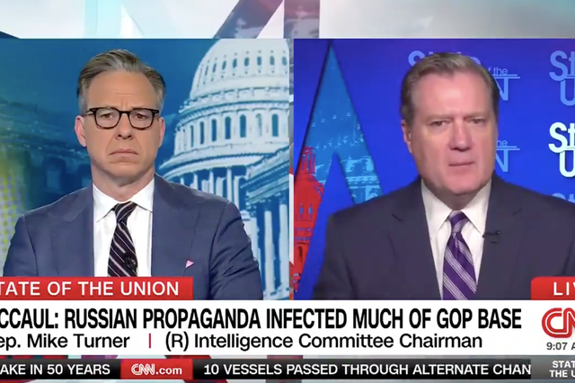 <p>Mike Turner (right) during his interview on CNN</p>