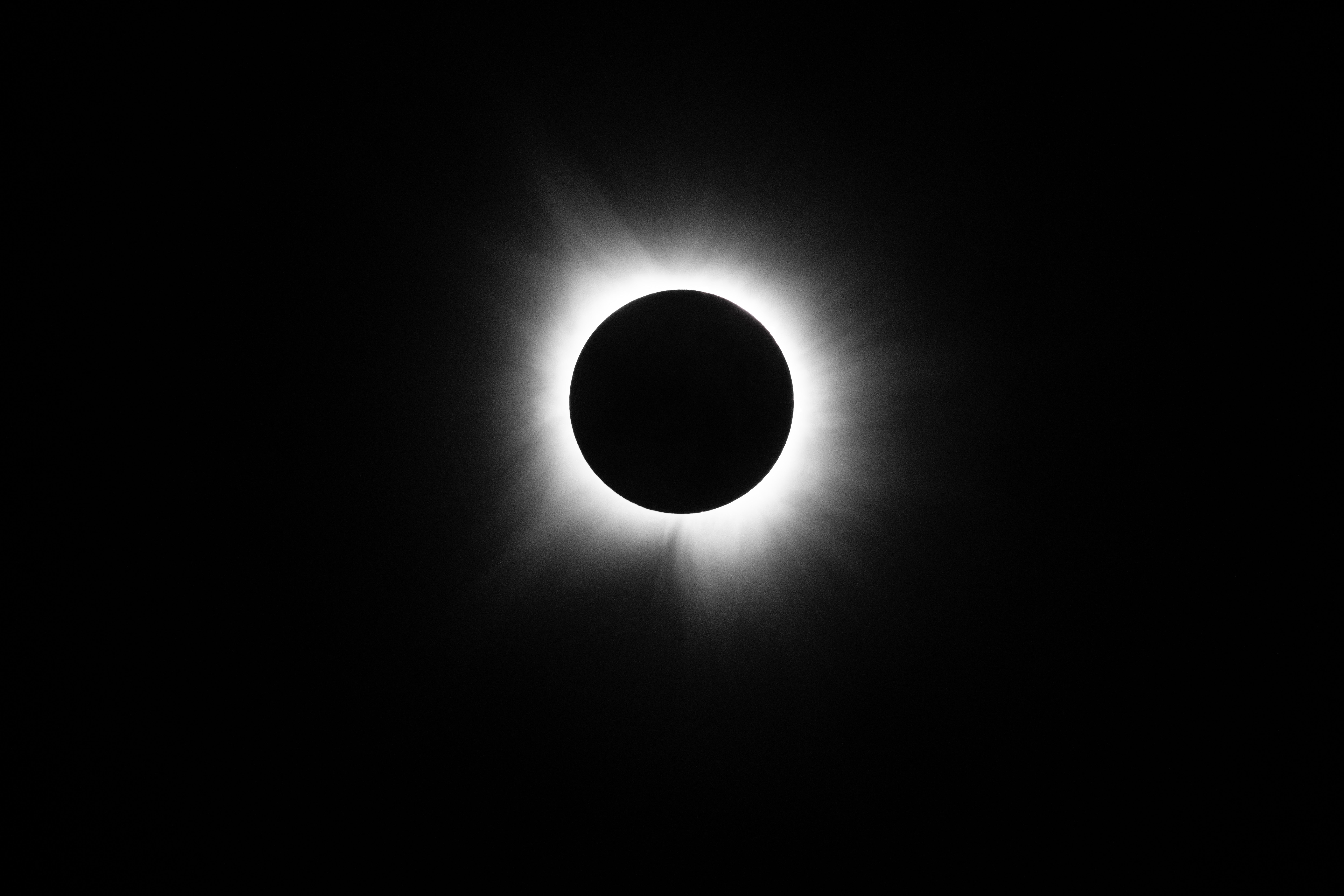 The moon fully passes over the sun's horizon during a total solar eclipse on April 08, 2024 in Brady, Texas