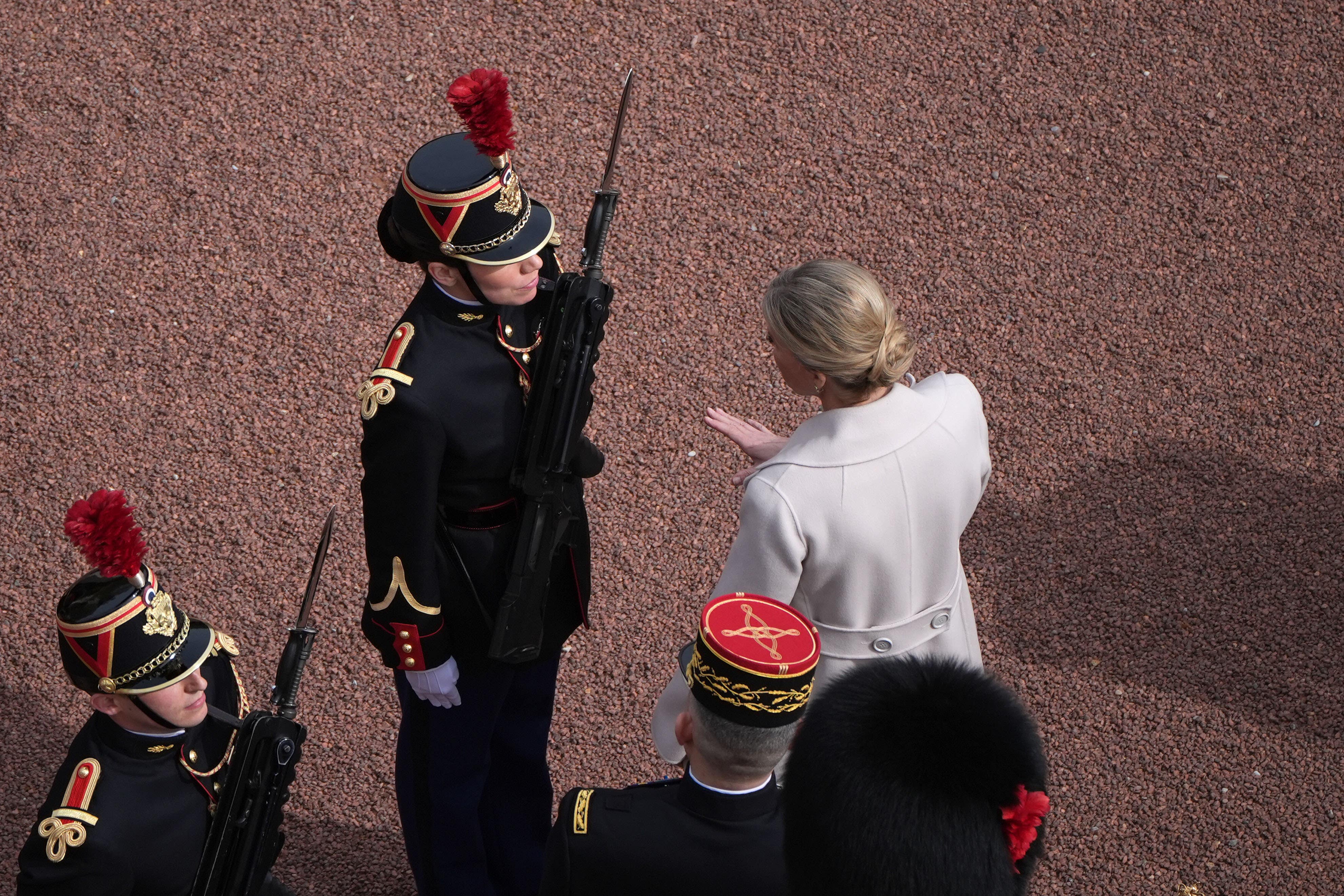 The Duchess of Edinburgh speaks to a Gendarmerie Garde Republicaine from France during a Changing of the Guard at Buckingham Palace, London (Aaron Chown/PA)