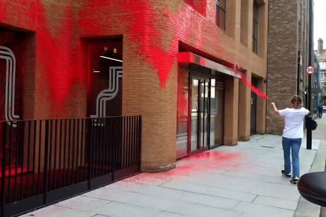 <p>Watch moment protesters spray red paint over Labour headquarters</p>