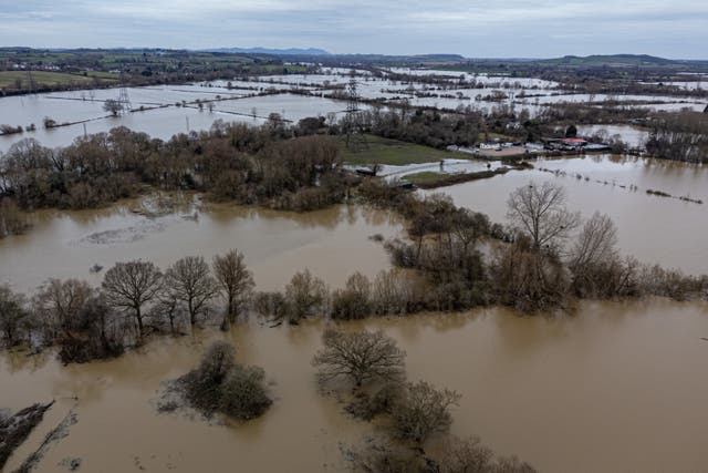 <p>Aerial view of flooded fields in Gloucestershire in early January during Storm Henk</p>