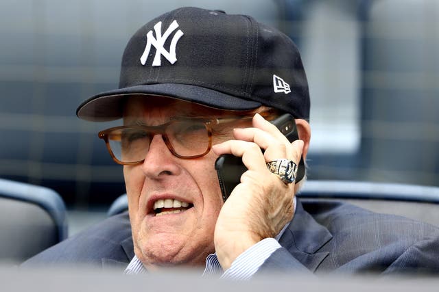 <p>Former mayor Rudy Giuliani boasting Yankees gear at a baseball game in May 2018 </p>