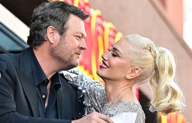 <p>Gwen Stefani and Blake Shelton embrace during her Hollywood Walk of Fame Star ceremony in 2023 </p>