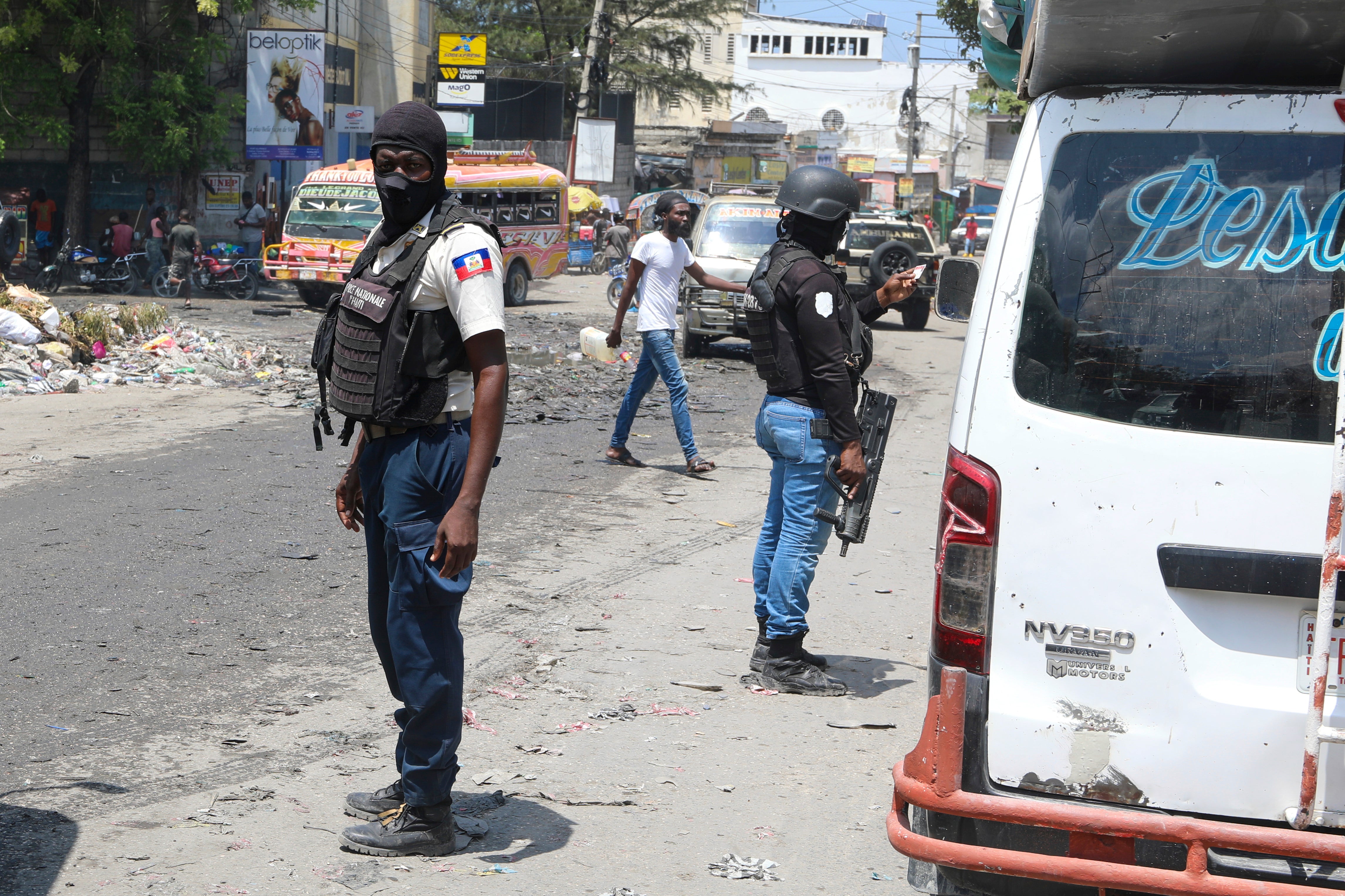 National Police patrol an intersection amid gang violence in Port-au-Prince, Haiti