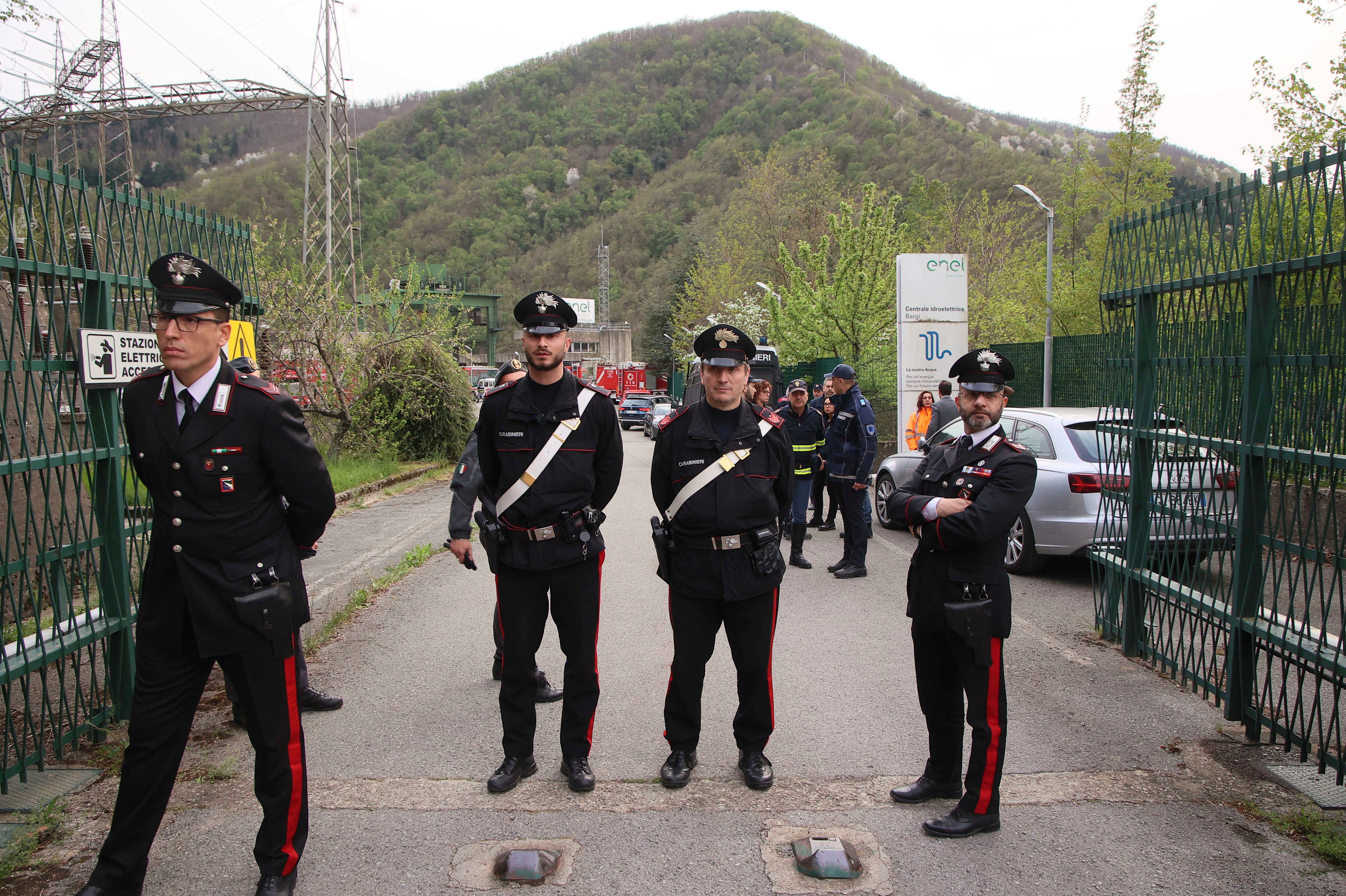 Carabinieri (Italian paramilitary police) officers on the site of an explosion occurred at the hydroelectric plant