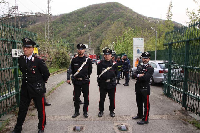 <p>Carabinieri (Italian paramilitary police) officers on the site of an explosion occurred at the hydroelectric plant</p>
