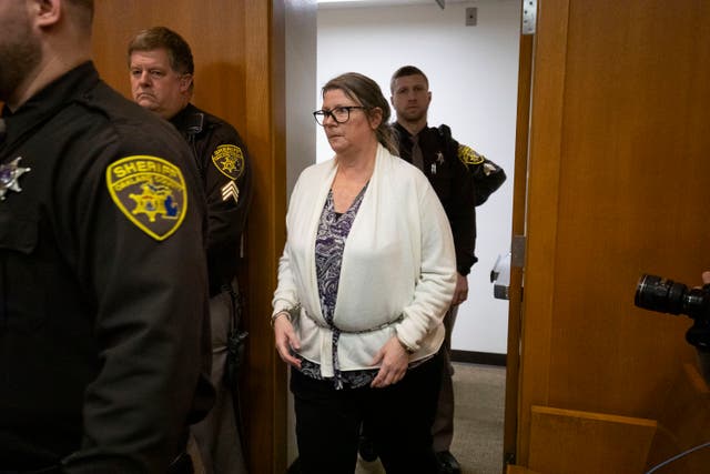 <p>Jennifer Crumbley, the mother of Oxford, Michigan high school shooter Ethan Crumbley, enters the court to hear the verdict just before the jury found her guilty on four counts of involuntary manslaughter on February 6, 2024 at Oakland County Circuit Court in Pontiac, Michigan. </p>