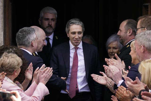 Newly elected Taoiseach Simon Harris leaves the Dail (Niall Carson/PA)