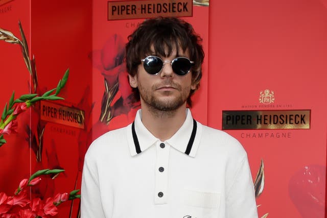 <p> Louis Tomlinson at Piper Heidsieck during the Australian Open</p>