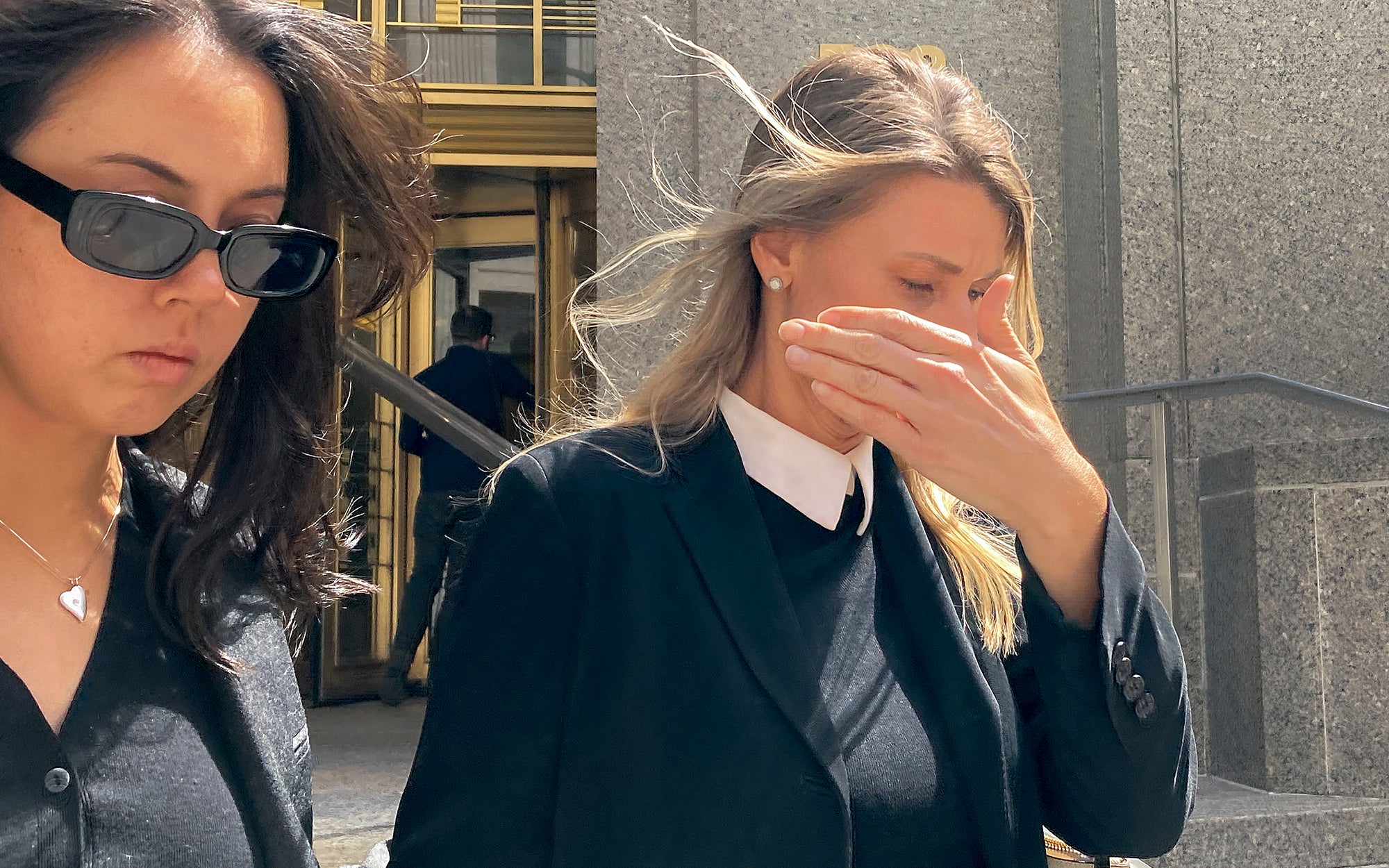 Aimee Harris, right, walking out of Manhattan federal court on 9 April, will spend one month in prison after stealing and selling Ashley Biden’s journal