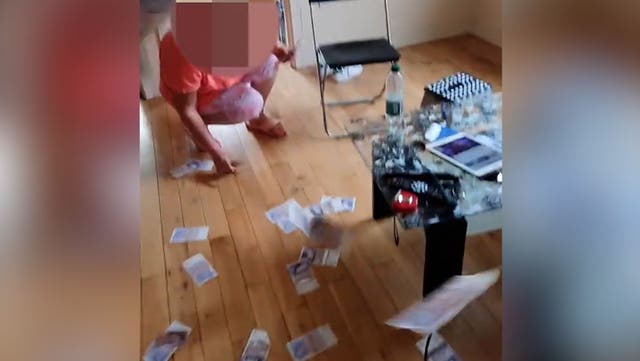 <p>Watch: Britain’s biggest-ever benefit fraud gang shower floor with £20 notes.</p>