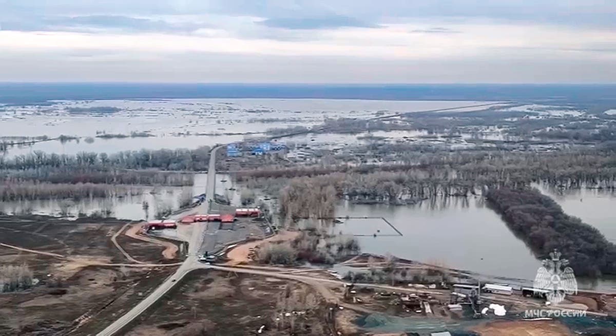 Water levels rise and homes flood in Russia after a dam bursts near the ...