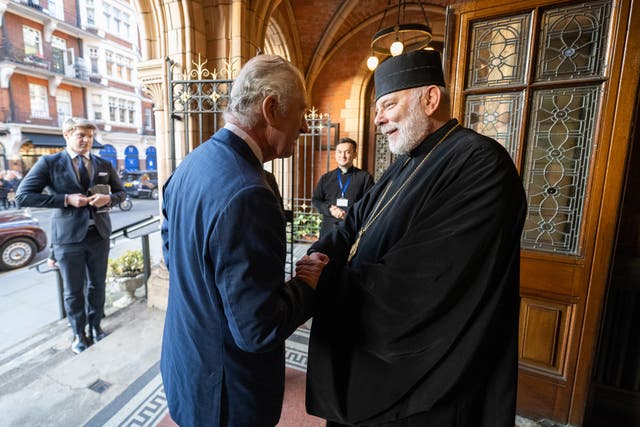 <p>Bishop Kenneth Nowakowski with King Charles outside of his cathedral in London on Wednesday </p>