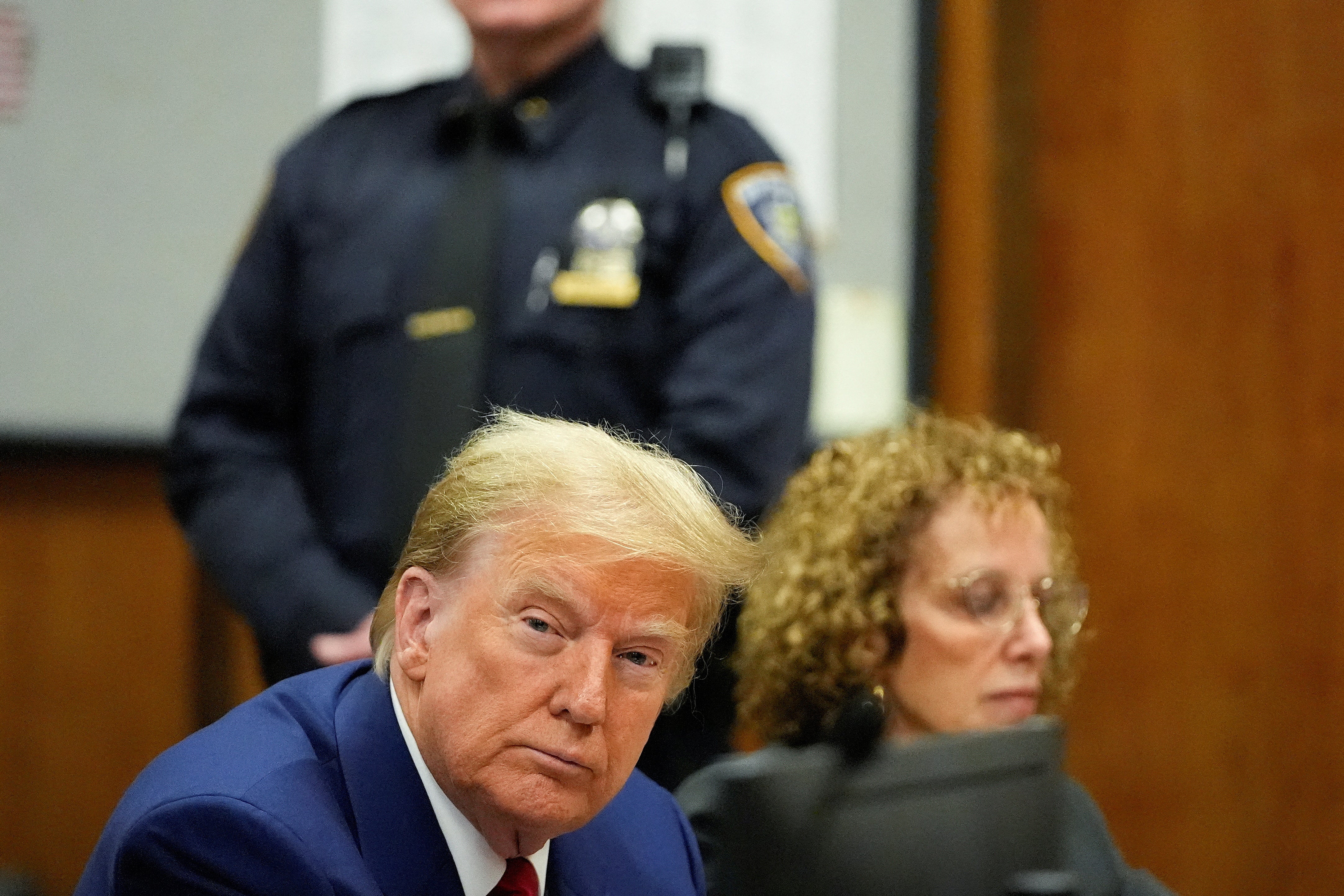 Donald Trump appears in a Manhattan criminal courtroom on 25 March