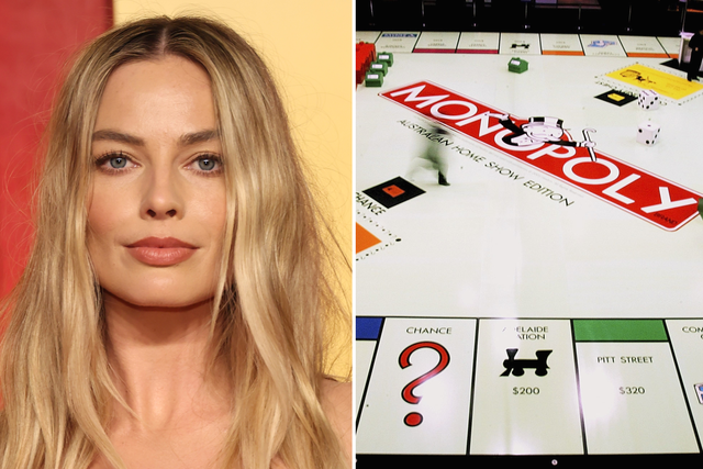 <p>Margot Robbie and game of Monopoly</p>