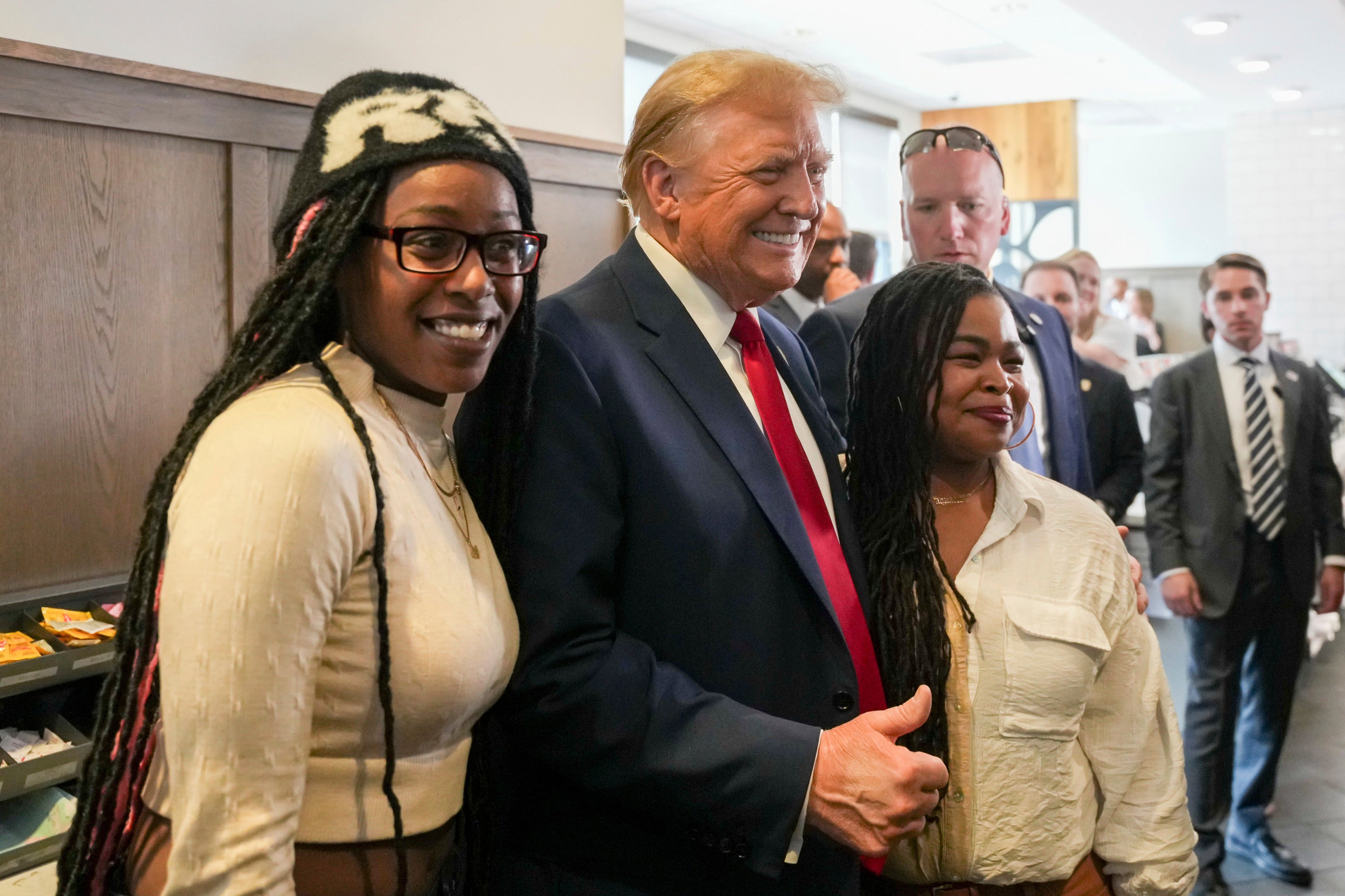 Trump poses for pictures with supporters