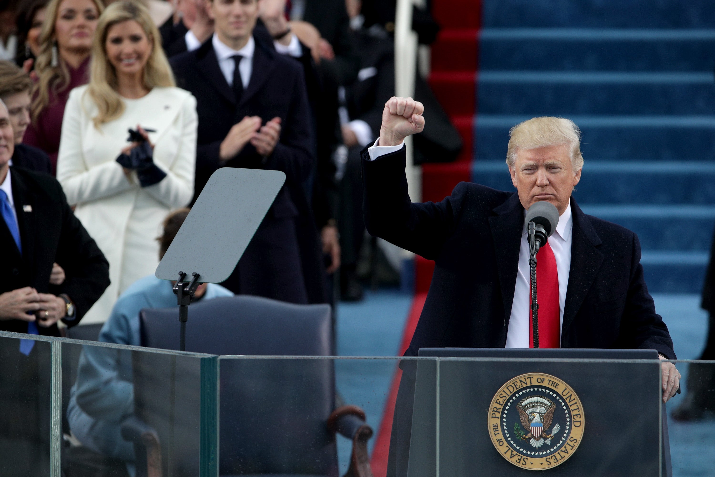 Trump raises a fist after his inauguration on 20 January 2017