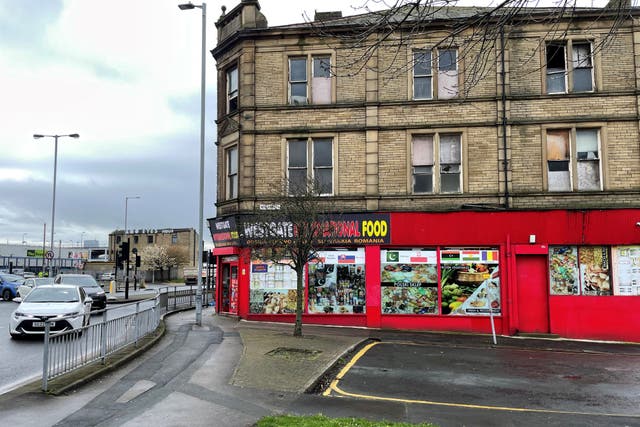 <p>The scene in Bradford city centre where Kulsuma Akter was stabbed to death in the street as she pushed her baby in a pram on Saturday afternoon</p>