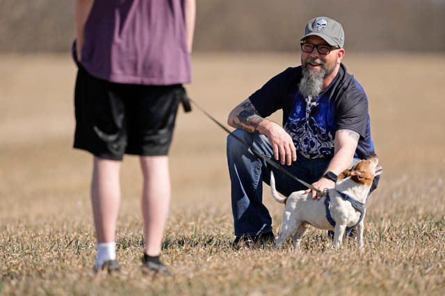 <p>Dusty Farr talks with his transgender daughter at a park near Smithville</p>