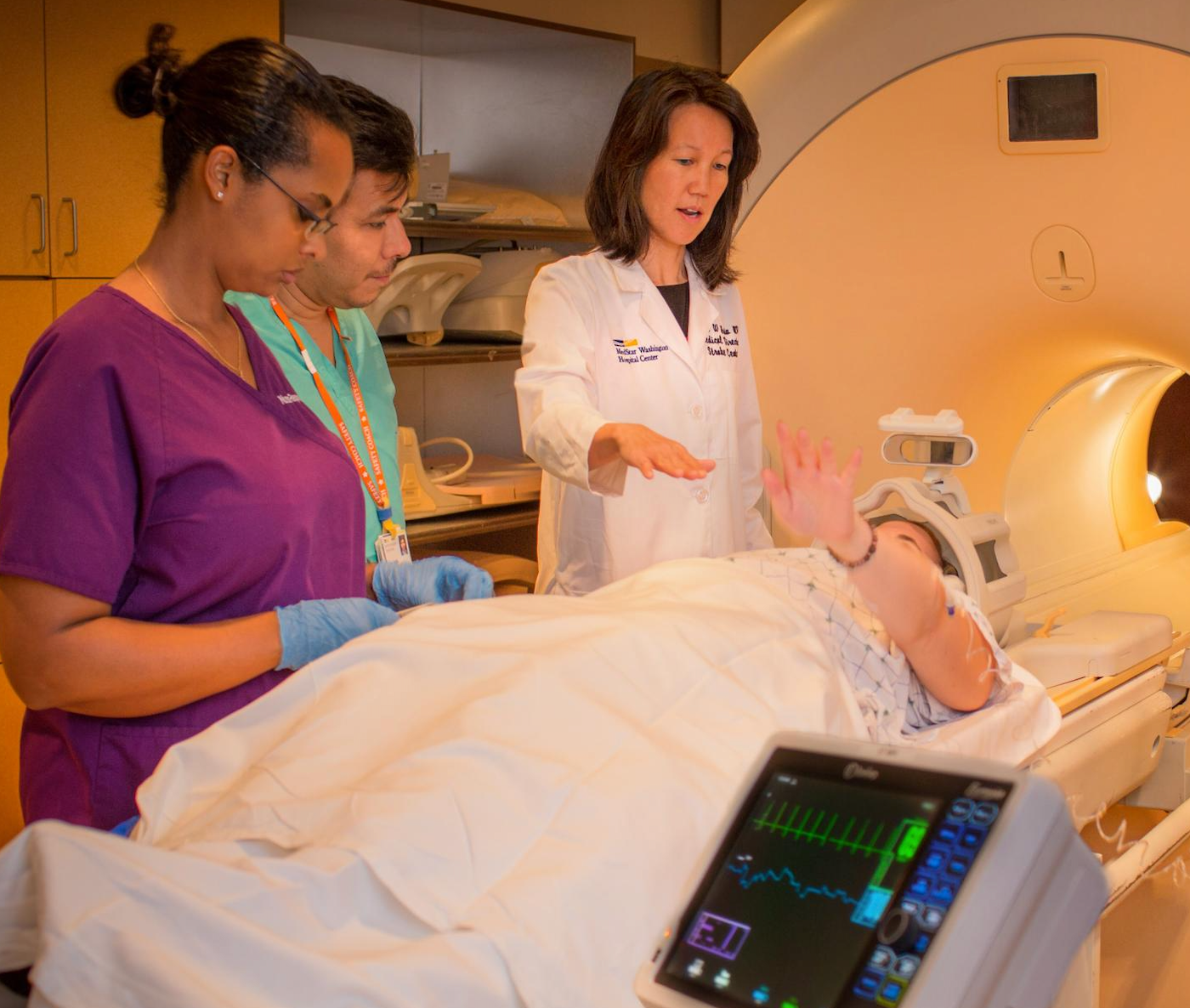 <p>Doctors evaluate a patient at Comprehensive Stroke Center, MedStar Washington Hospital</p>