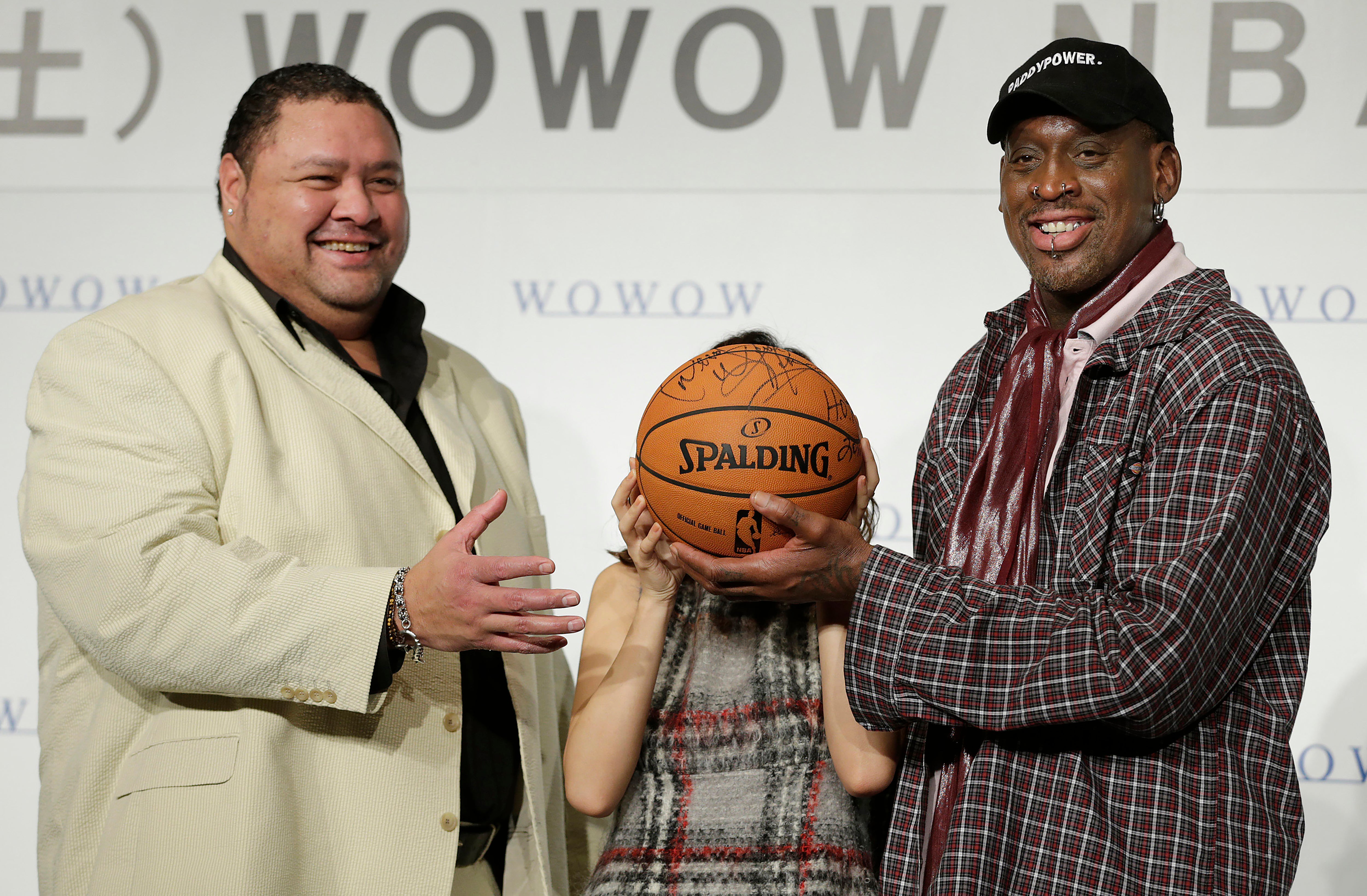 Former NBA basketball player Dennis Rodman, right, former sumo grand champion Akebono, left