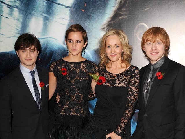 <p>JK Rowling photographed with Daniel Radcliffe, Emma Watson and Rupert Grint at a ‘Harry Potter’ premiere in 2010</p>