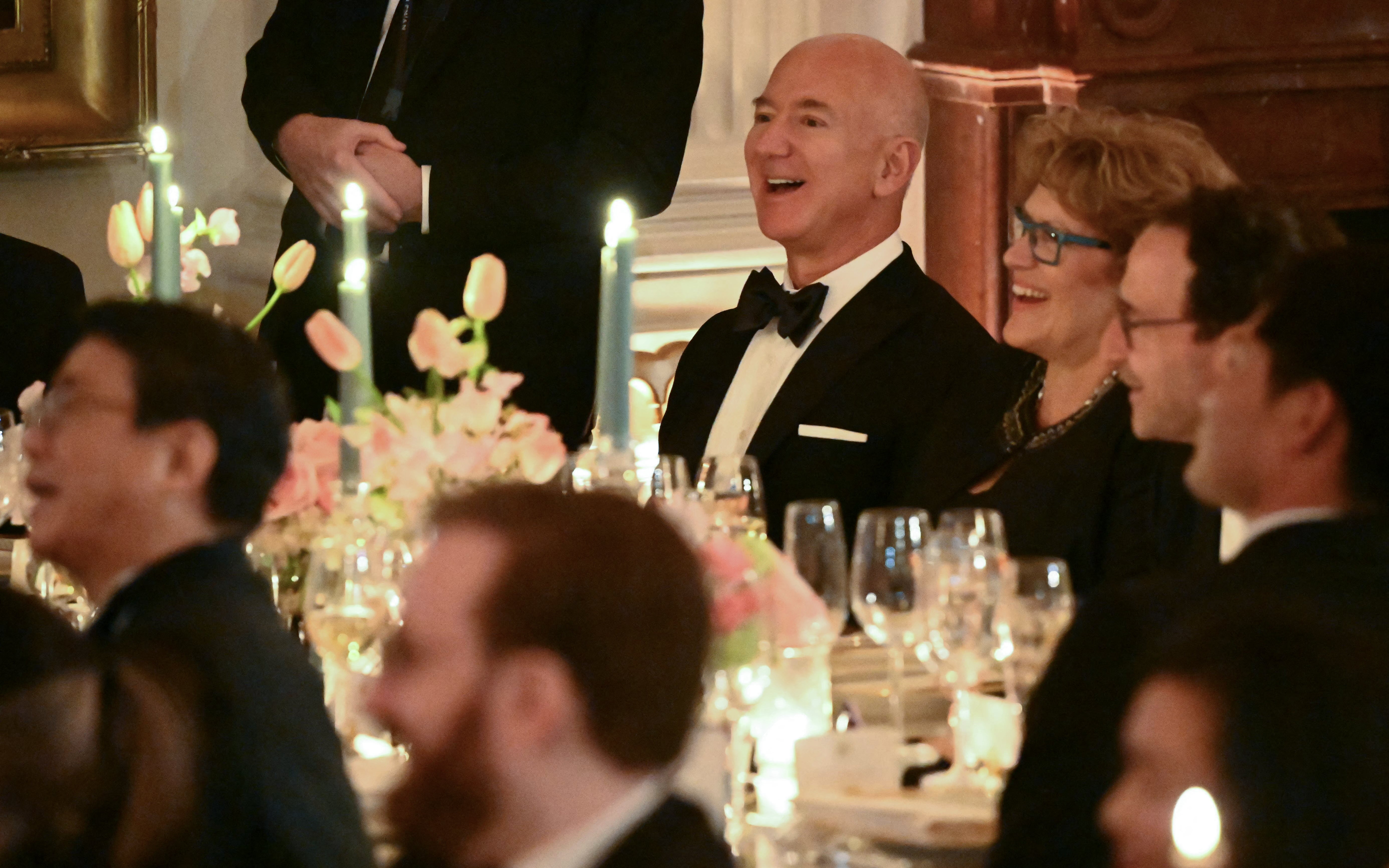 Big Tech moguls Tim Cook and Jeff Bezos (pictured), who was joined by Lauren Sanchez, were also in attendance