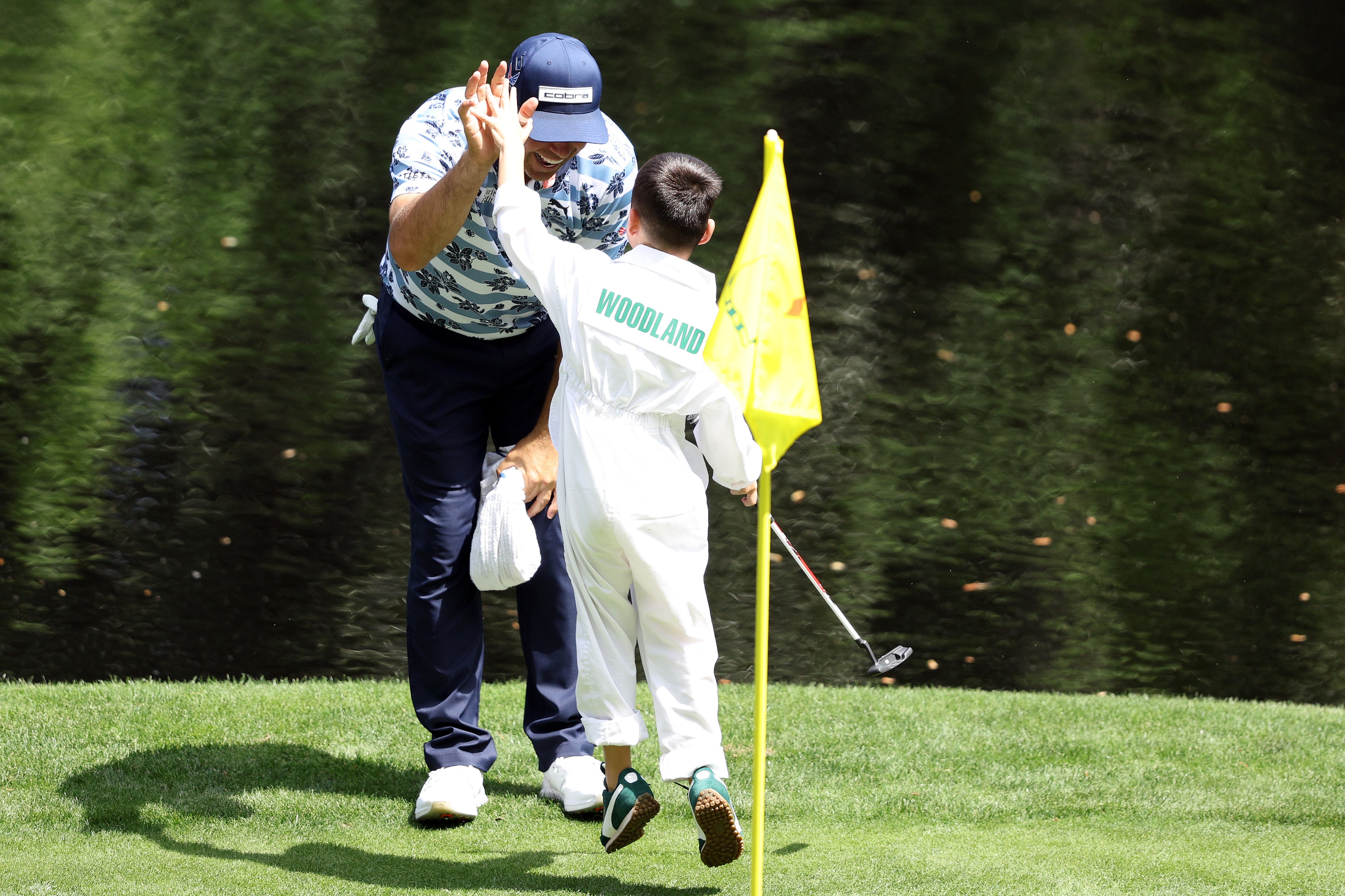 Gary Woodland hit a career first hole-in-one at The Masters par three day after recovering from surgery.