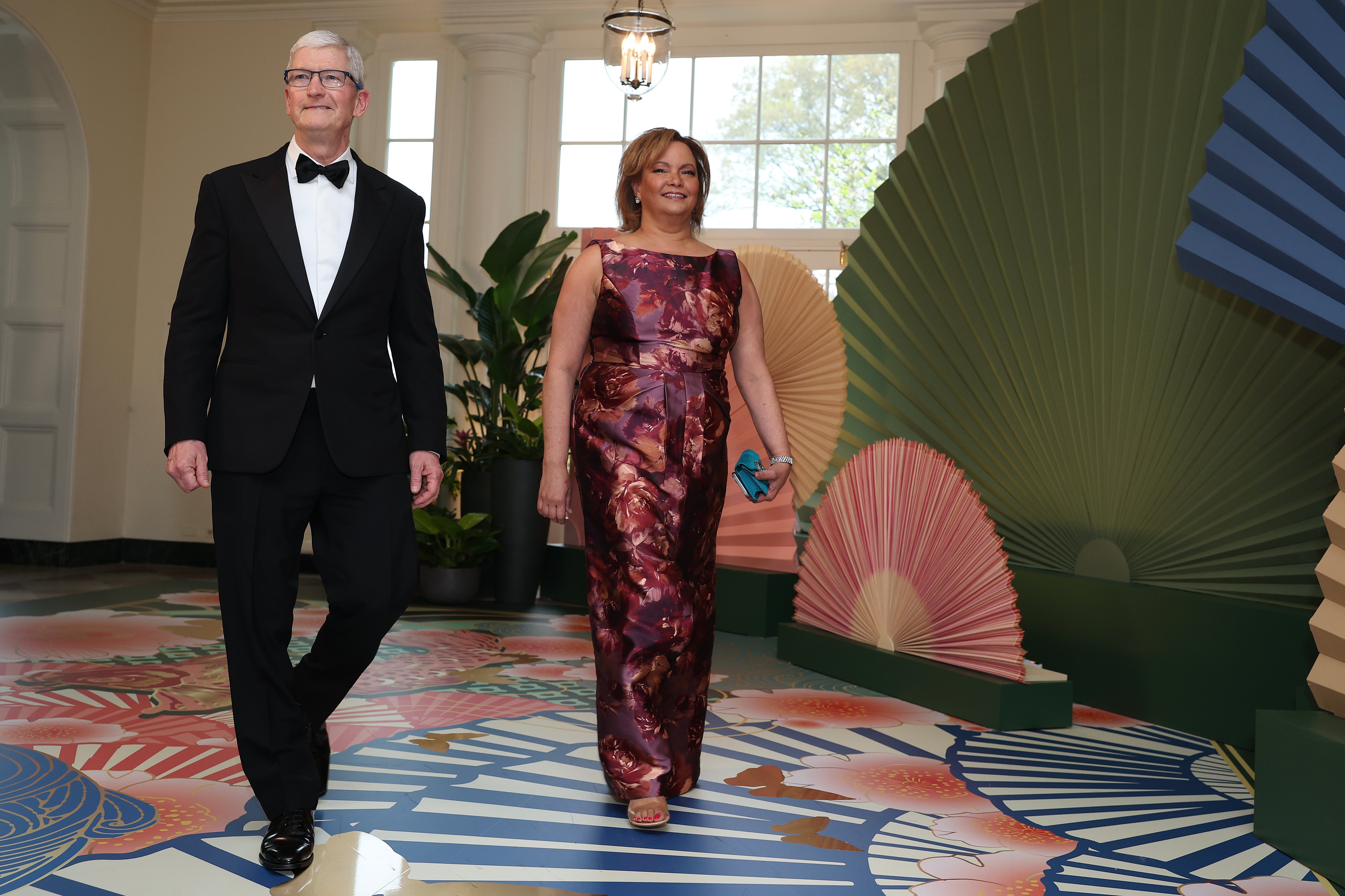 Apple CEO Tim Cook and Apple vice-president Lisa Jackson
