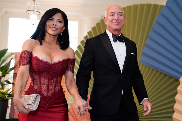 <p>Executive chairman of Amazon Jeff Bezos and actress Lauren Sanchez arrive for a State Dinner in honor of Japanese Prime Minister Fumio Kishida, at the Booksellers Room of the White House in Washington, DC</p>