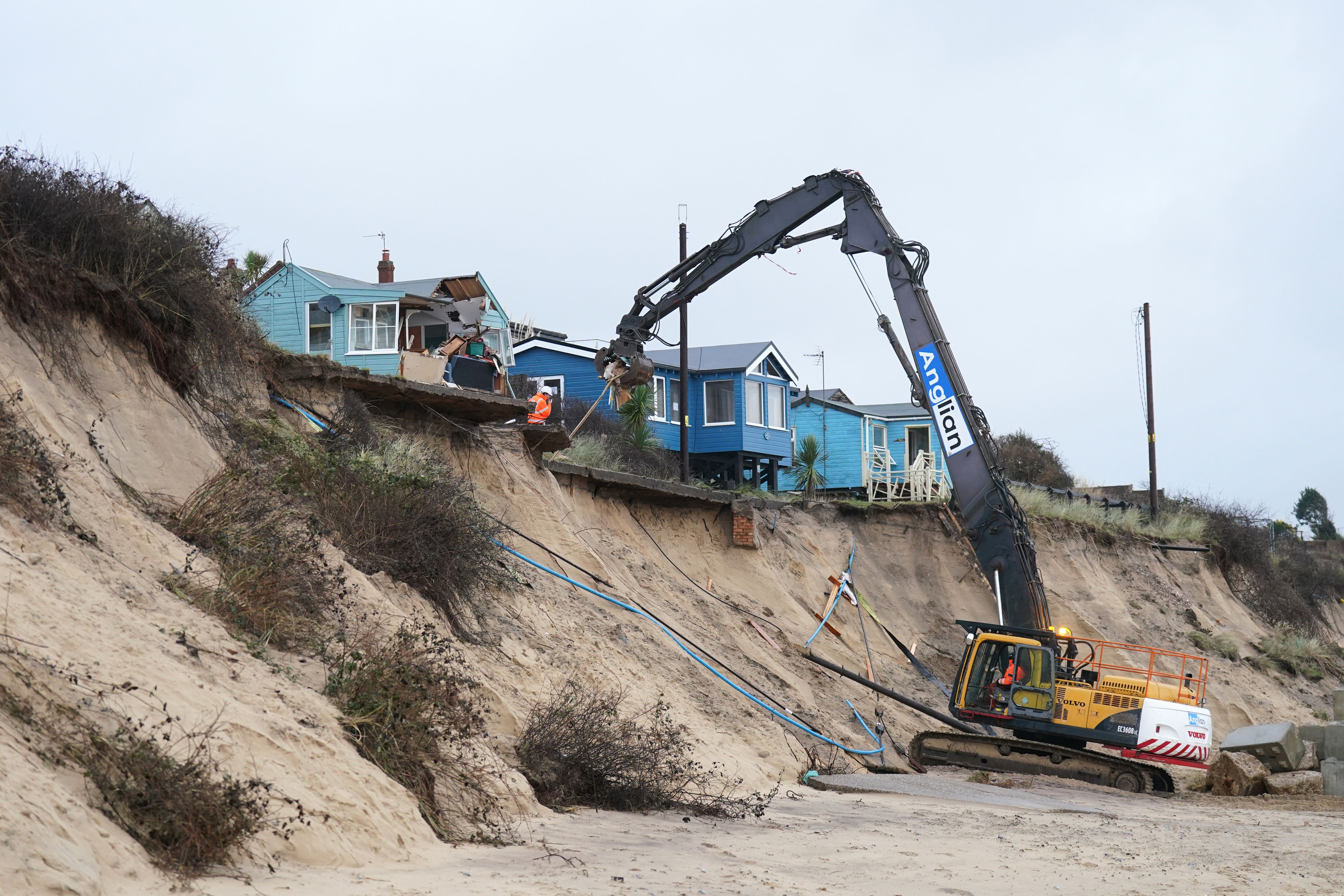 Houses are demolished in Hemsby, Norfolk (Joe Giddens/PA)