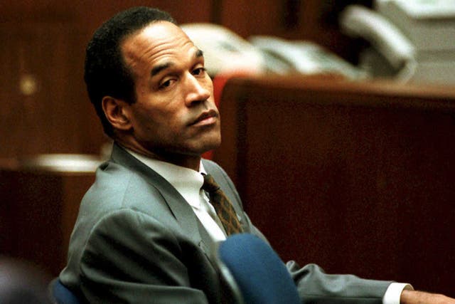<p> O. J. Simpson sits in Superior Court in Los Angeles 08 December 1994 during an open court session</p>
