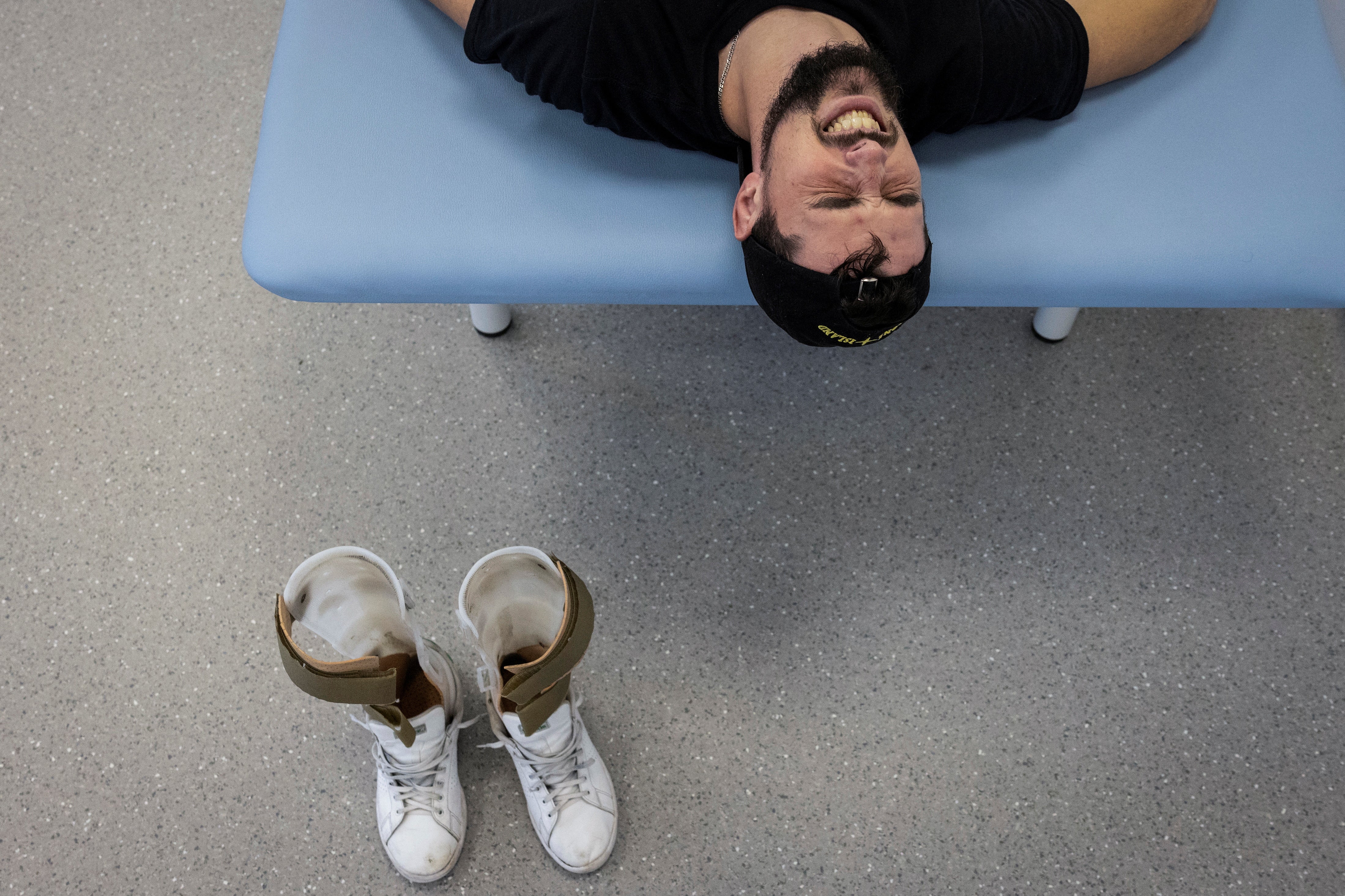 Rostyslav Prystupa, a Ukrainian marine who was injured in the spine while defending Mariupol, exercises at the Recovery Rehabilitation Center, amid Russia's attack on Ukraine, in Kyiv,