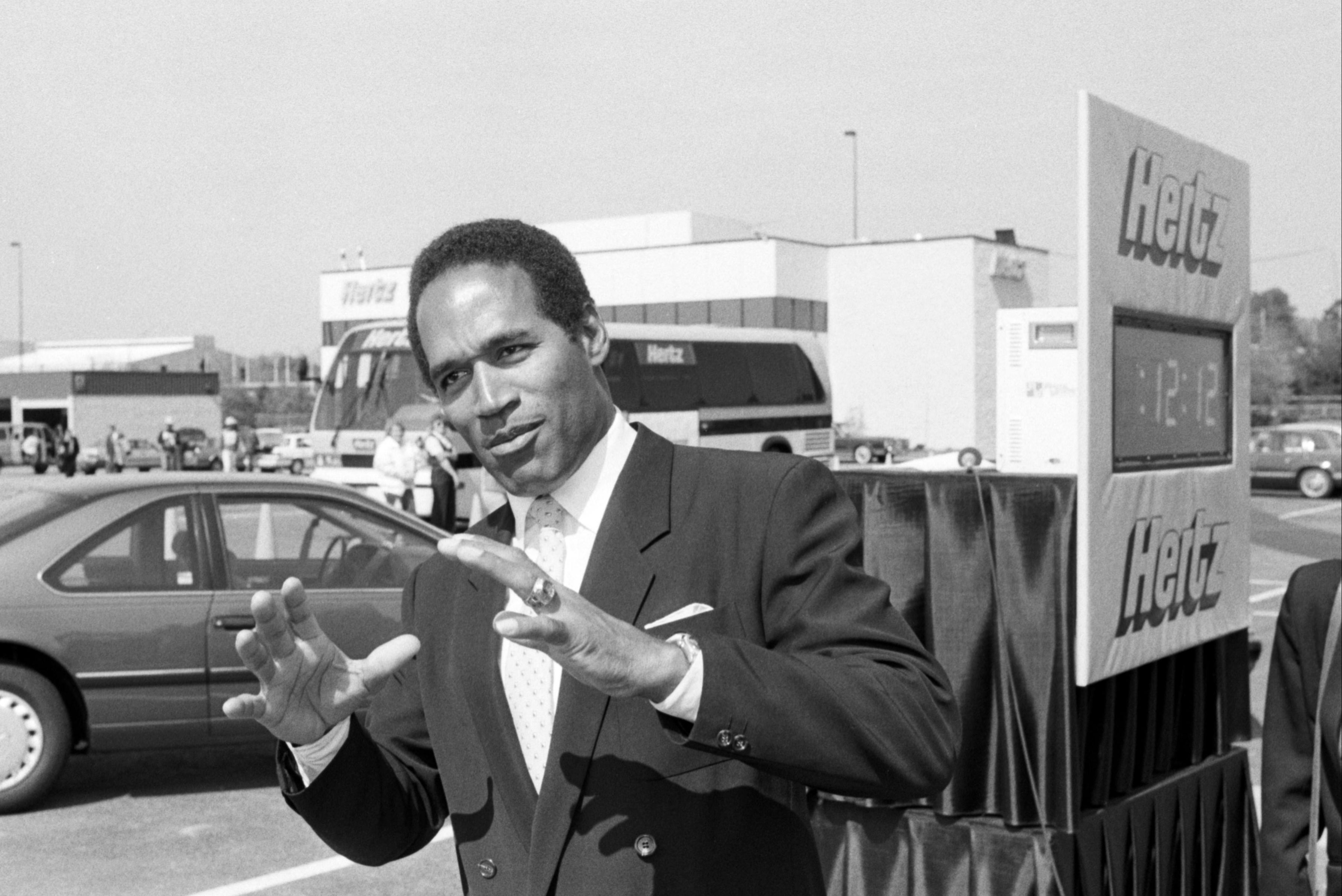 Simpson during a filming of a Hertz commercial at Atlanta Airport
