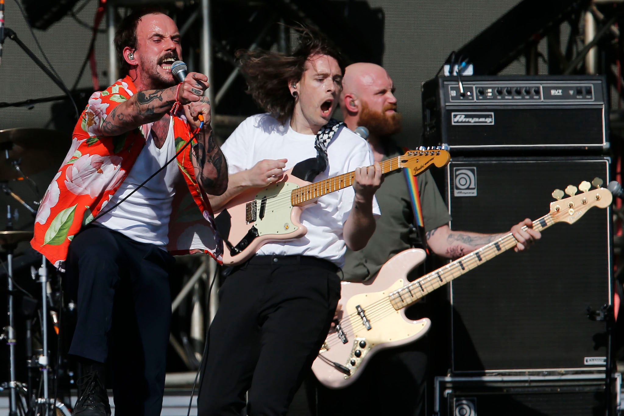 Talbot, Kiernan and Devonshire of Idles perform during day one of Lollapalooza Chile 2022