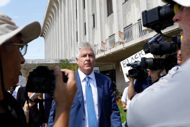 <p>Evan Corcoran leaves a federal courthouse in West Palm Beach, Florida in September 2022. </p>